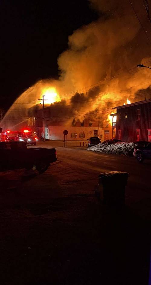 A picture containing outdoor, track, smoke, fire

Description automatically generated