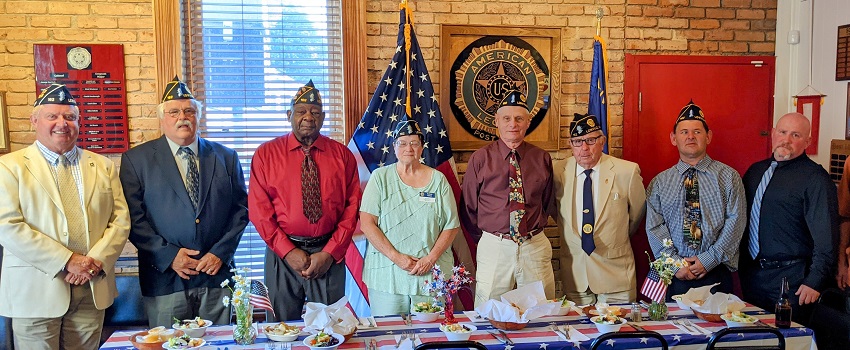 A picture containing text, person, indoor, group

Description automatically generated