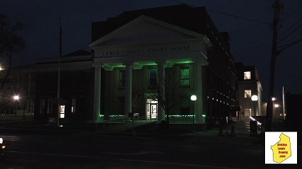 A building with green lights at night

Description automatically generated with low confidence