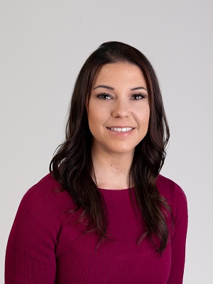 A person smiling for the camera

Description automatically generated with low confidence