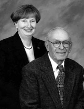 Two people smiling

Description automatically generated with medium confidence