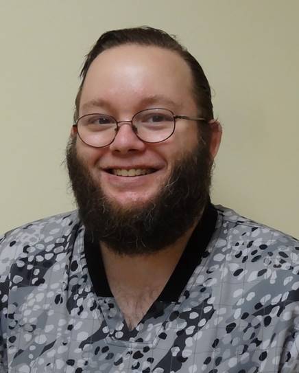 A person with a beard and glasses

Description automatically generated with medium confidence