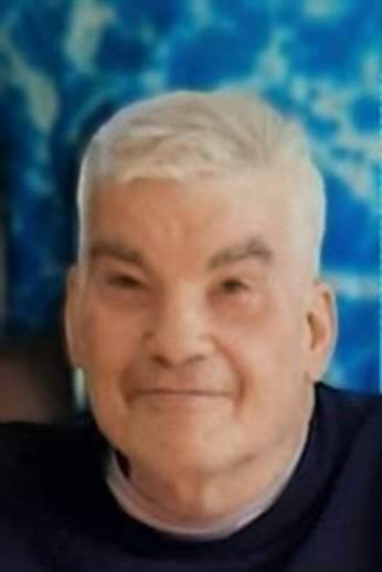 A person with white hair

Description automatically generated with medium confidence