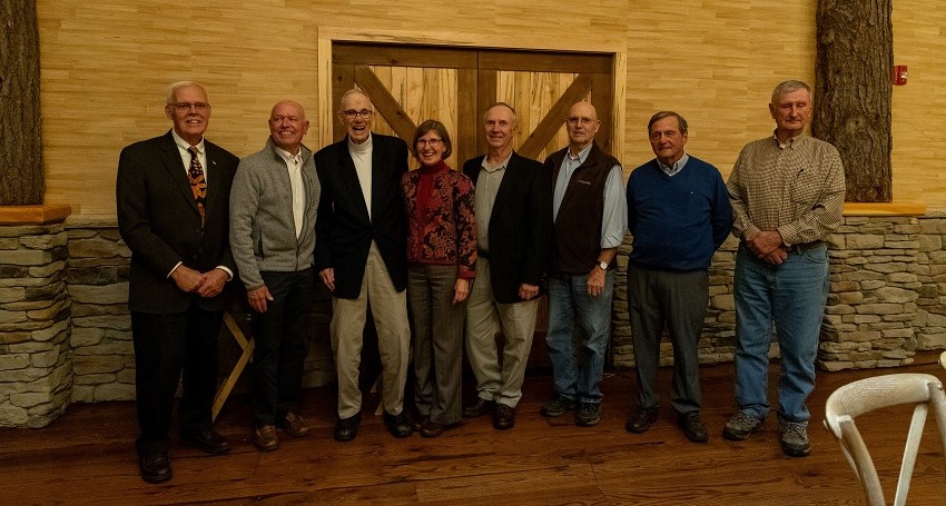 A group of people posing for a photo

Description automatically generated