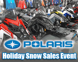 A group of snowmobiles in a store

Description automatically generated