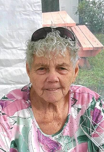 An old person with sunglasses on her head

Description automatically generated