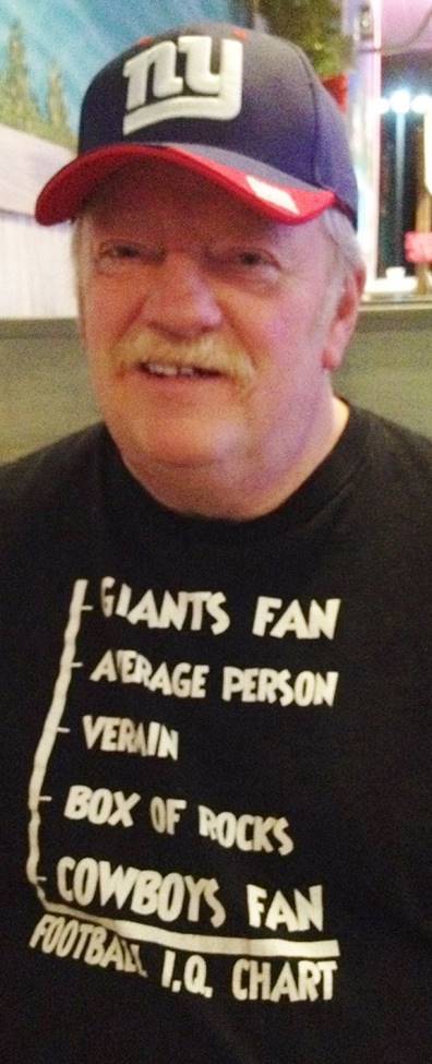 A person wearing a black shirt

Description automatically generated
