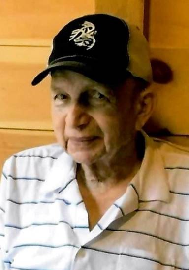 An old person wearing a hat

Description automatically generated