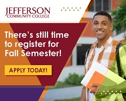 A person holding a tablet and smiling

Description automatically generated