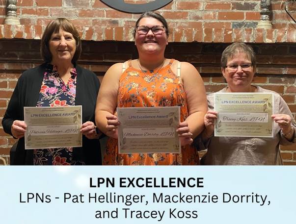 A group of women holding certificates

Description automatically generated