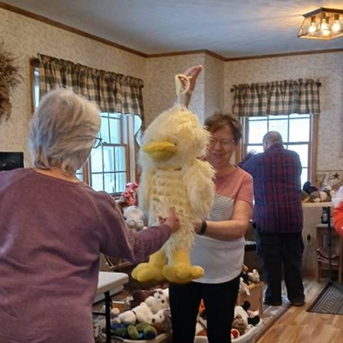 A person holding a stuffed animal

AI-generated content may be incorrect.
