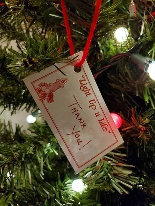 A tag on a christmas tree

Description automatically generated