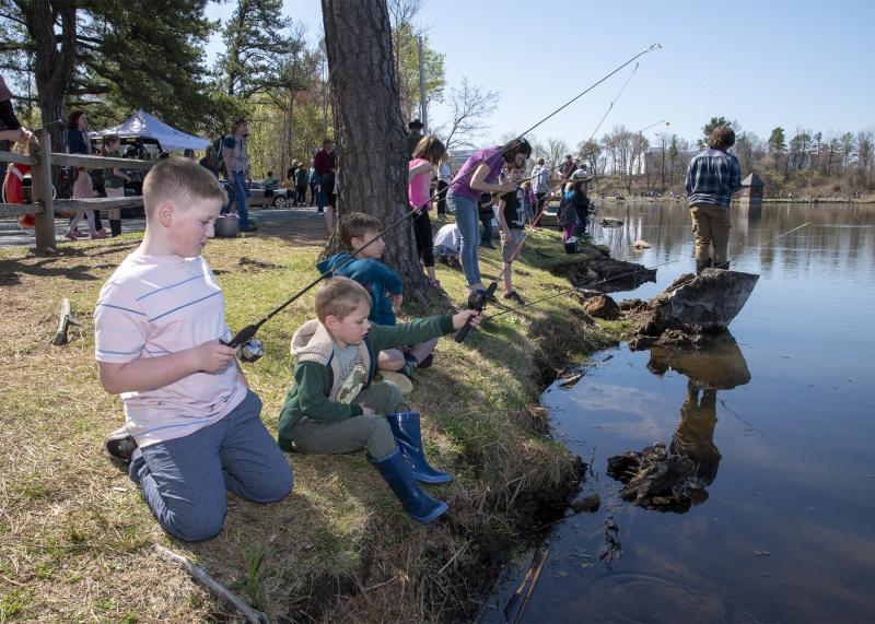 people fishing on land at six mile