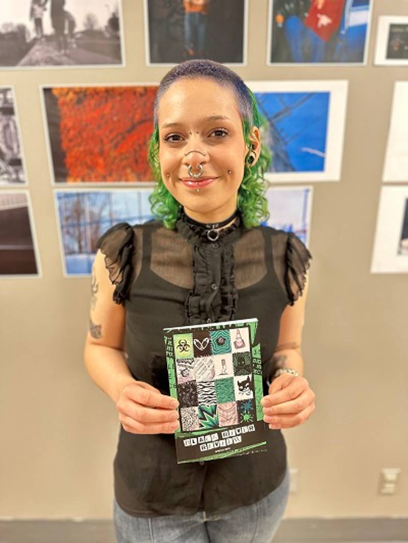 A person holding a piece of art
AI-generated content may be incorrect.