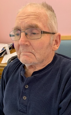 A person wearing glasses and a blue shirt

AI-generated content may be incorrect.