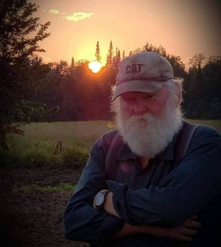 A person with a white beard and a hat

AI-generated content may be incorrect.