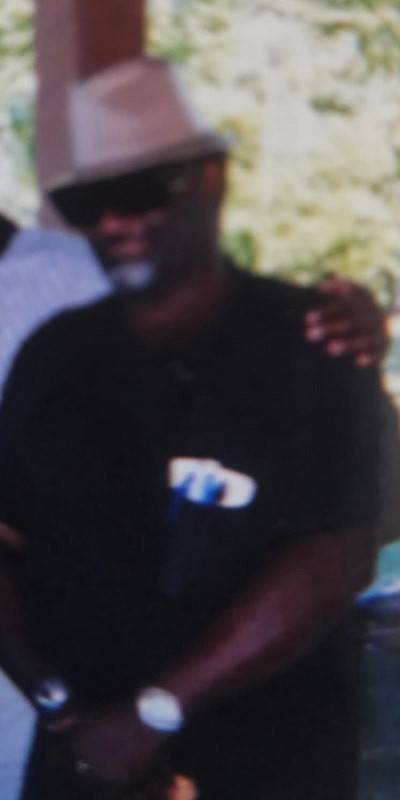 A person with his arm around his shoulder

AI-generated content may be incorrect.