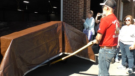 A person holding a brown object

AI-generated content may be incorrect.