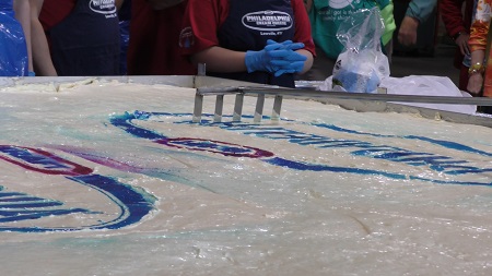 A person working on a piece of dough

AI-generated content may be incorrect.