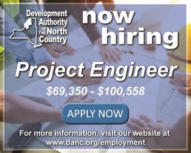 A close-up of a group of people working on a project

AI-generated content may be incorrect.