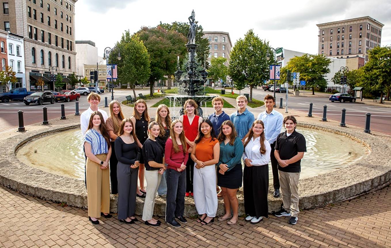 A group of people posing for a photo
AI-generated content may be incorrect.