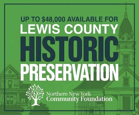 A green and white sign with buildings and trees

AI-generated content may be incorrect.