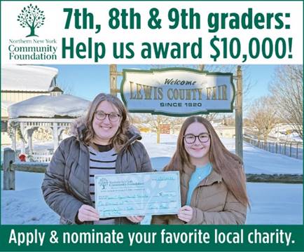 Two women holding a check

AI-generated content may be incorrect.