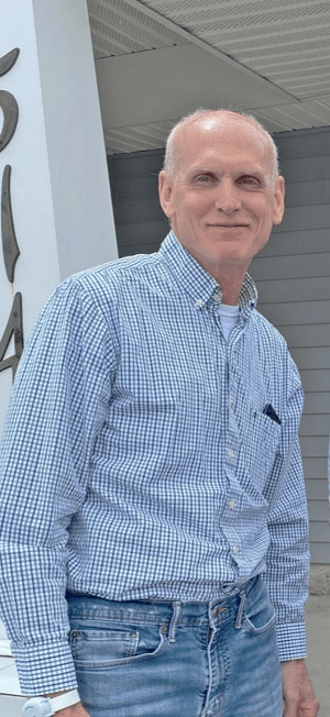 A person wearing a blue and white checkered shirt

AI-generated content may be incorrect.