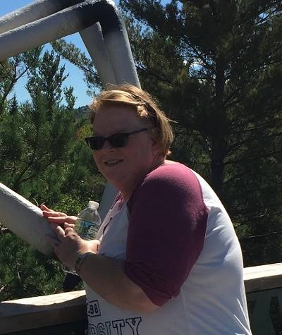 A person standing on a bridge

AI-generated content may be incorrect.