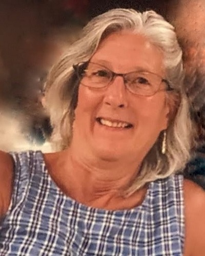 A person wearing glasses and a plaid dress

AI-generated content may be incorrect.