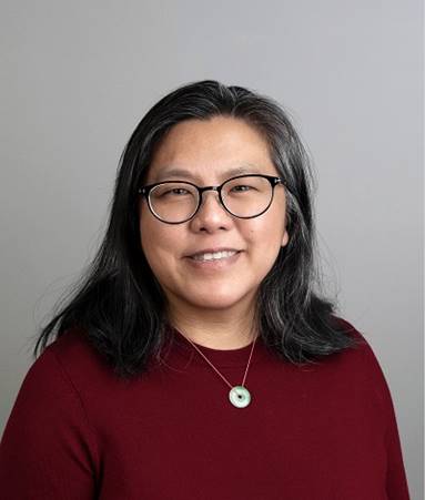 A person wearing glasses and a red shirt

AI-generated content may be incorrect.