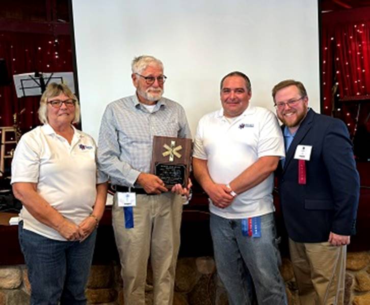 A group of people posing for a photo

AI-generated content may be incorrect.