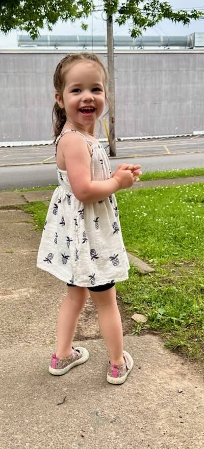 A child in a dress

AI-generated content may be incorrect.