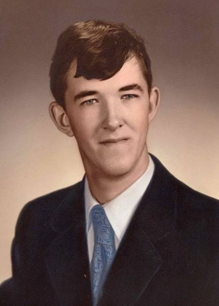 A person in a suit and tie

AI-generated content may be incorrect.