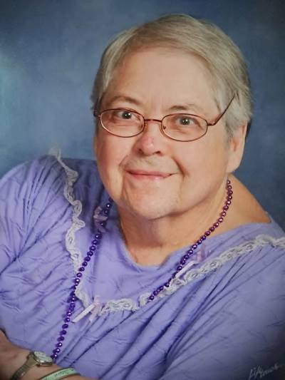 A person wearing a purple dress

AI-generated content may be incorrect.