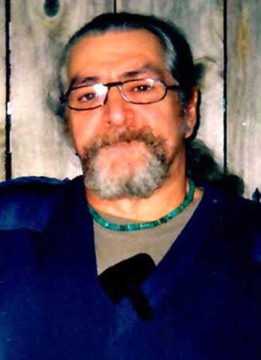 A person with a beard and a blue shirt

AI-generated content may be incorrect.