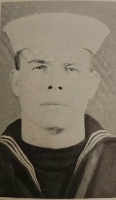 A close-up of a person in a sailor's uniform

AI-generated content may be incorrect.