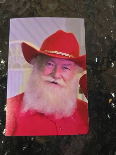A person with a white beard and red hat

AI-generated content may be incorrect.