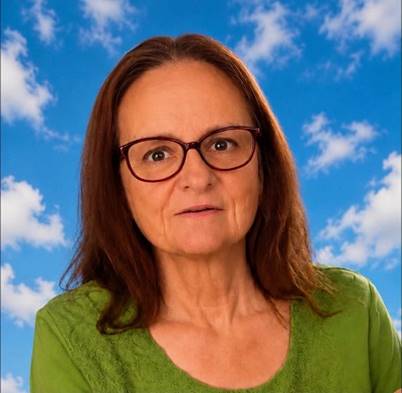 A person wearing glasses and a green shirt

AI-generated content may be incorrect.