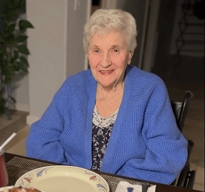 An old person sitting at a table with a plate

AI-generated content may be incorrect.