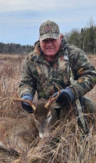 A person holding a deer

AI-generated content may be incorrect.