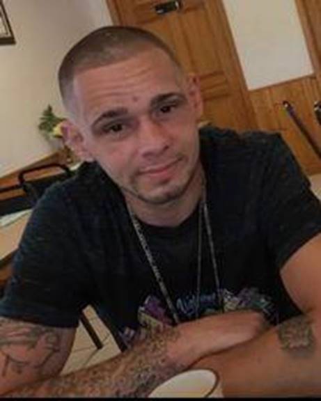 A person with tattoos on his arms

AI-generated content may be incorrect.