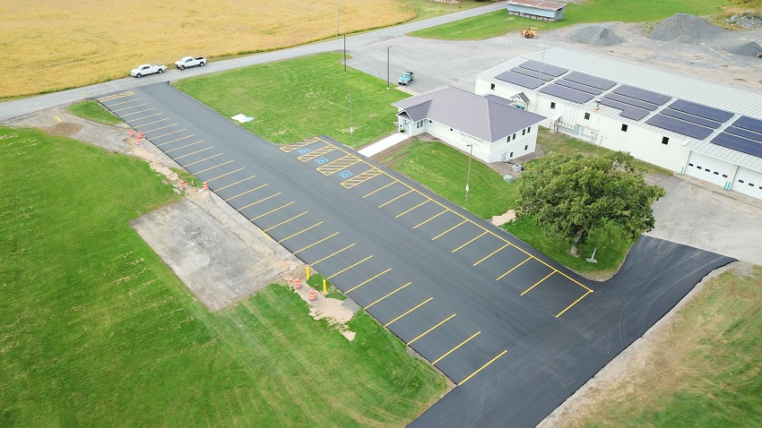 An aerial view of a parking lot

AI-generated content may be incorrect.