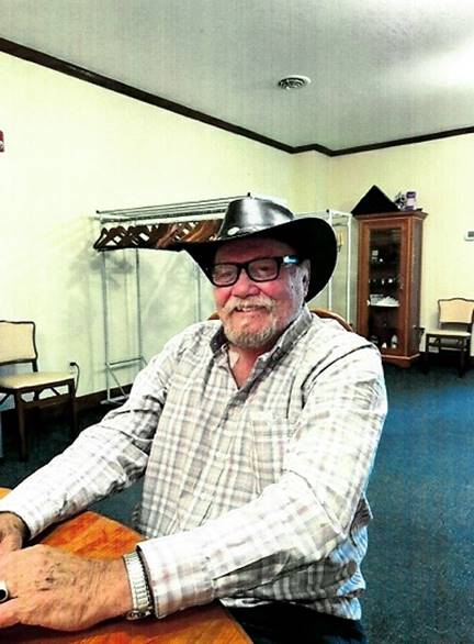 A person wearing a cowboy hat

AI-generated content may be incorrect.