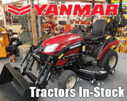 A red tractor with a bucket

Description automatically generated